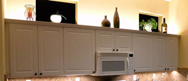 lighting on top of cabinets